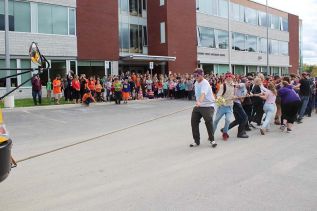 The GREC student body turned out in force to cheer on the senior class as they pulled a school bus as part of a Terry Fox Run challenge.